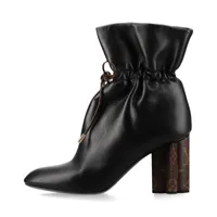 セール！ルイヴィトン スプラッシュライン モノグラム レインブーツ　37   黒 楽天市場】LOUIS VUITTON ルイヴィトン スプラッシュ ライン