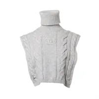 CHANEL シャネル　ノースリーブ　ハイネック　ニット　ヴィンテージ シャネル ココマーク 05A カシミヤ ノースリーブニット 38