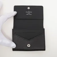 ヴィトン タイガ アンヴェロップカルト ドゥヴィジットNM M64595