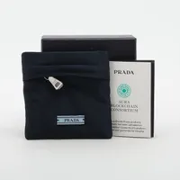 プラダ トライアングルロゴ ヘアピン GP アイボリー×シルバー