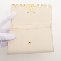 ヴィトン トリヨン ポルトフォイユカプシーヌコンパクト M11363