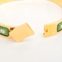 エルメス エマイユPM バングル GP ゴールド×グリーン A3547503｜中古