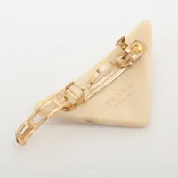 プラダ 1IF090 バレッタ GP×レジン×ラインストーン アイボリー  