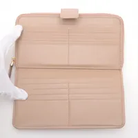プラダ ヴィッテロムーブ 1ML348 レザー 財布 ベージュ 接着剤