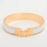 HERMES エルメス クリックH エナメルブレスレットPM ゴールド/ホワイト エナメルブレスレット 《クリックH》 | Hermès - エルメス-公式