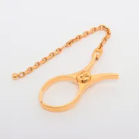 エルメス フィルー グローブホルダー GP ゴールド A3707176｜中古