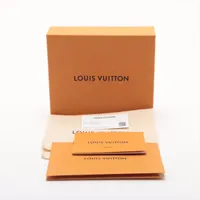 ヴィトン LVロゴ ポルトフォイユ カプシーヌ タイニー M14298 ホワイト