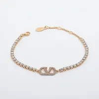 ヴァレンティノ Vロゴ シグネチャー ブレスレット GP×ラインストーン