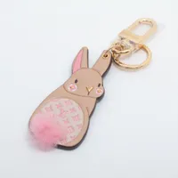 ヴィトン M00994 CX1253 チャーム PVC×レザー ベージュ×ピンク ポルト