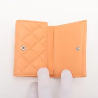 色褪せ、汚れ、箱あり　CHANEL 三つ折り財布　オレンジ 色褪せ、汚れ、箱あり CHANEL 三つ折り財布 オレンジ CHANEL