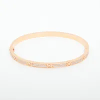 カルティエ ラブ オープンバングル ブレスレット 750(YG) 23.8g