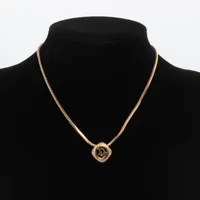 クリスチャンディオール Diorロゴ ネックレス GP×ラインストーン