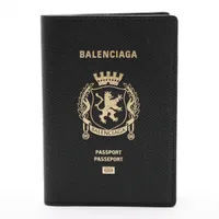 BALENCIAGA パスポートケース ショルダー付 黒 ゴールドロゴ BALENCIAGA パスポートケース ショルダー付 黒 ゴールドロゴ