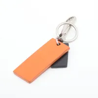 セリーヌ ロゴ チャーム レザー オレンジ A3828256｜中古