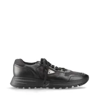 【ラグジュアリー】PRADA リナイロン&レザースニーカー ブラック Prada レザースニーカー | ブラック | FARFETCH JP