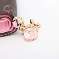 ヴィトン モノグラム ポケットウォレット LVチャーム 型番
