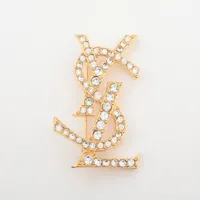 イヴサンローラン YSL  ブローチ アクセサリー ロゴ ゴールドカラー Yves Saint Laurent YVES SAINT LAURENT YSL logo rhinestone