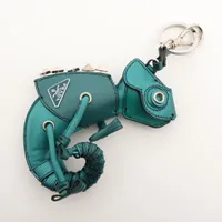 プラダ カメレオン チャーム GP×革 グリーン A3842791｜中古