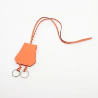 エルメス プティアッシュ チャーム レザー オレンジ×ブラウン
