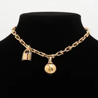 ティファニー ハードウェア ラップ リンク ブレスレット 750(YG) 47.5g