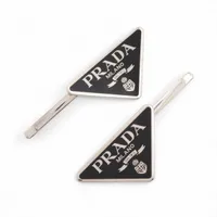 プラダのバレッタ。 ベージュ/トータスカラー プレックスxメタル バレッタ | PRADA