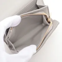 ヴィトン トリヨン ポルトフォイユ カプシーヌ タイニー M12406