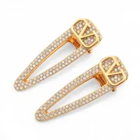 プラダ トライアングル カチューシャ メタル×ラインストーン