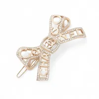 プラダ トライアングル カチューシャ メタル×ラインストーン シルバー