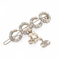 プラダ トライアングル カチューシャ メタル×ラインストーン シルバー