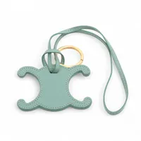 セリーヌ マイクロバーティカルカバ チャーム PVC×レザー ブラック