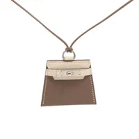 エルメス イスム ペンダント バッファローホーン カーキ×グリーン