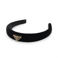 プラダ ロゴ バレッタ レジン×GP×ラインストーン ピンク A2533686