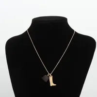 Hermès Amulet Malokinie PM Necklace Buffalo horn x GP Brown x gold