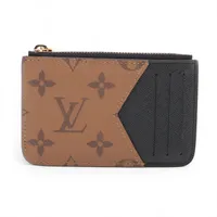 ヴィトン モノグラムアンプラント ポルト カルト ロミー 型番 ライト