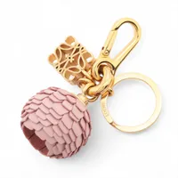 ロエベ アナグラム チャーム GP×レザー ゴールド×ピンク フラワーモチーフ