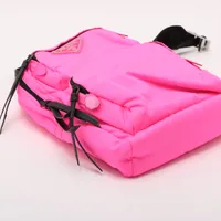 Prada Tessuto nylon x leather Sling backpack Pink 1BZ026 open
