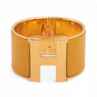 エルメス クリッククラックHバングルTGM バングル GP ゴールド×イエロー