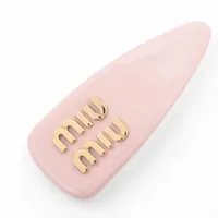 ミュウミュウ ロゴ ヘアクリップ GP×レジン×ラインストーン ピンク