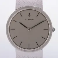 コルム 18K 手巻き シルバー文字盤 ＡＢランク