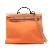 エルメス エールバッグジップMM トワルオフィシエ×カーフレザー オレンジ シルバー金具