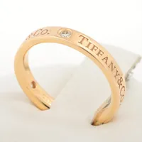 ティファニー フラットバンド 3P ダイヤ リング 750(PG)