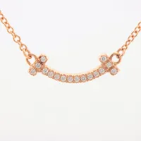 ティファニー Tスマイル ミニ ダイヤ 750(PG)