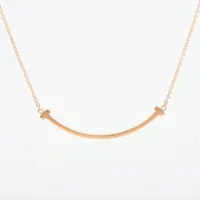 ティファニー Tスマイル スモール 750(YG)