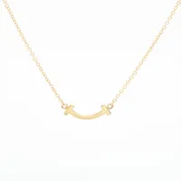 ティファニー Tスマイル ミニ 750(YG)