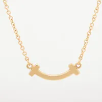 ティファニー Tスマイル ミニ 750(YG)