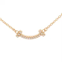 ティファニー Tスマイル ミニ ダイヤ 750(YG)