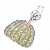 ヴィトン LV × YK ポルト クレ パンプキン M01103 レザー×メタル キーホルダー CX0273