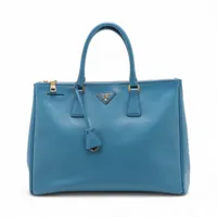 プラダ カナパ デニム ハンドバッグ ブルー ABランクの買取参考価格