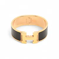 エルメス クリッククラックHラージ GP バングル FI0135 ブラック×ゴールド