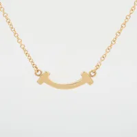 ティファニー Tスマイル ミニ 750(YG)